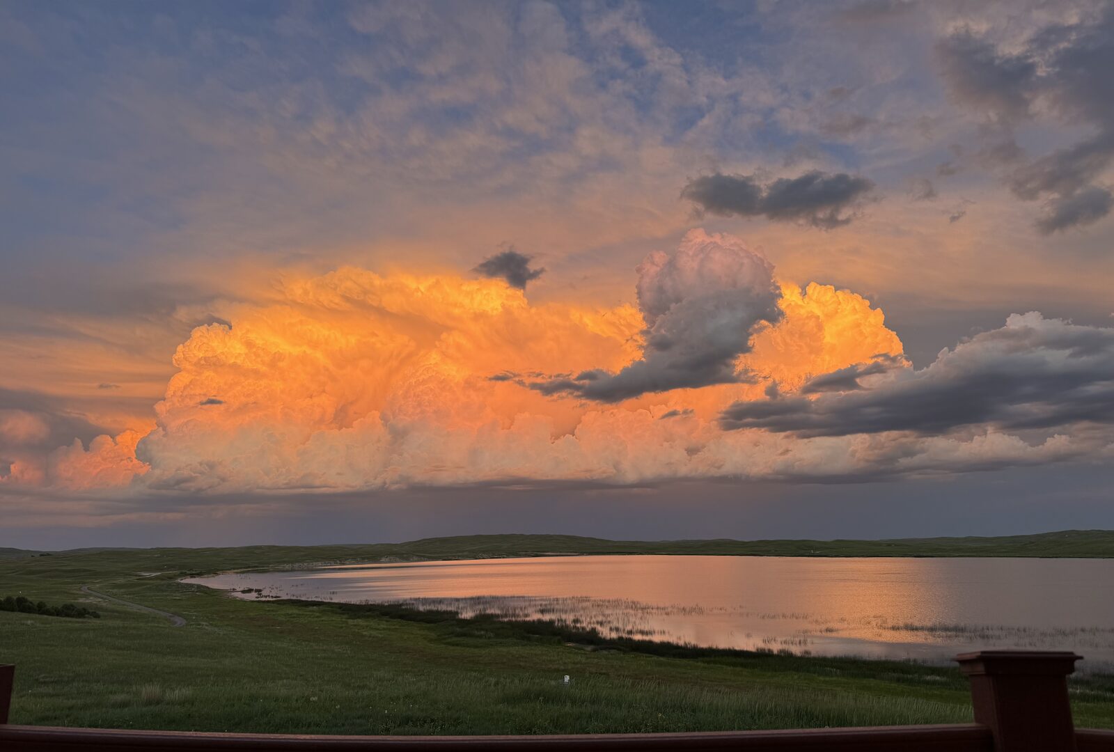 Storm cloud sunset reflected in Lake Alkali